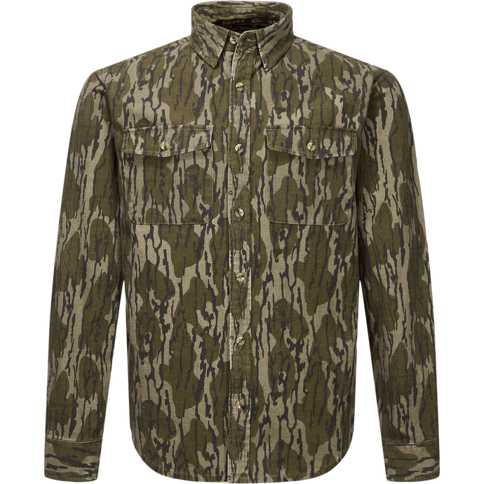 Throwback 80 Button Down Shirt with camouflage print, two chest flap pockets, and reinforced forearms, crafted from durable 8.3oz cotton twill, ideal for rugged outdoor wear.