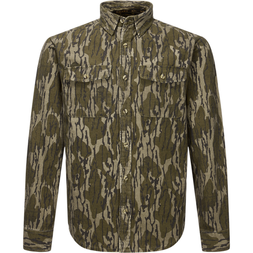 Throwback 80 Button Down Shirt with camouflage print, two chest flap pockets, and reinforced forearms, crafted from durable 8.3oz cotton twill, ideal for rugged outdoor wear.