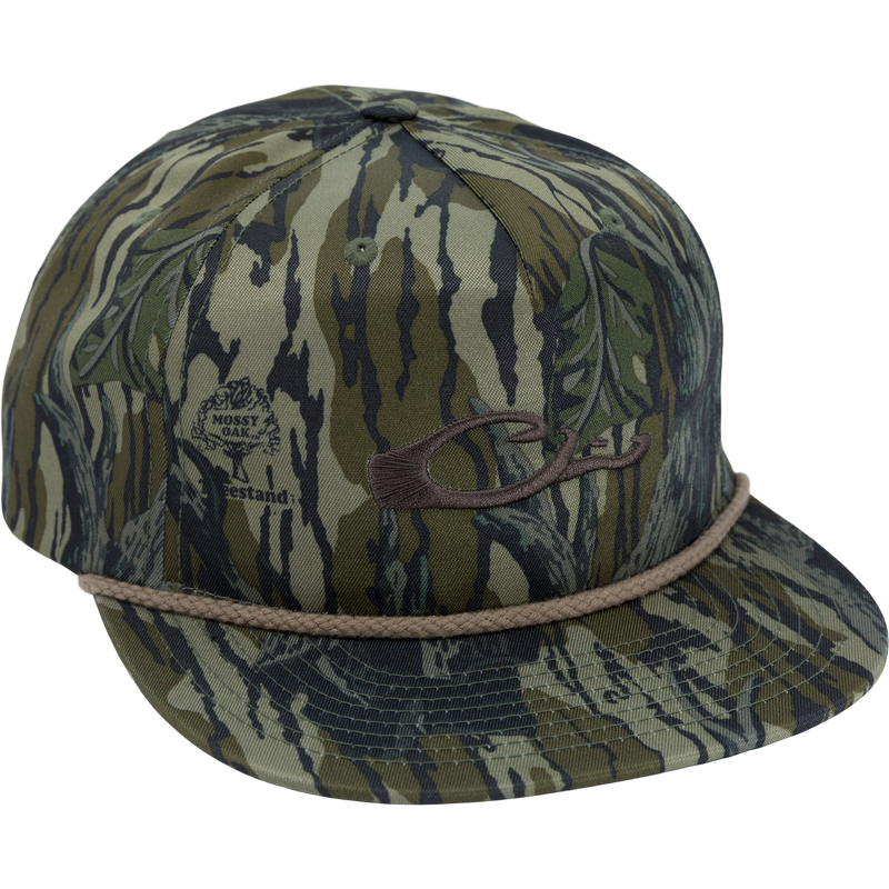 Drake X Richardson 256XE Flatbill Cap features a green-brown “tiger stripe” camouflage, embroidered logo, braided bill rope, and snapback for adjustable fit.