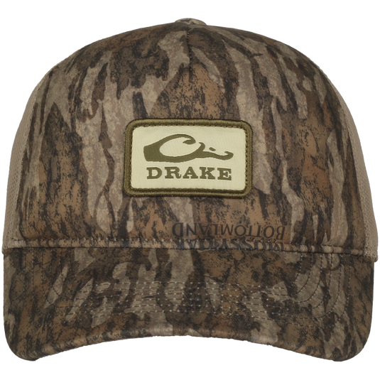 Foam Trucker Logo Cap featuring camo pattern, curved brim, Drake logo patch, foam front, and mesh back for breathability and comfort.