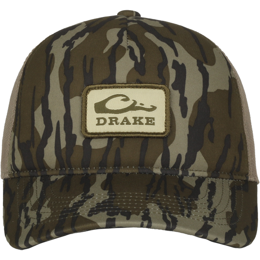 Foam Trucker Logo Cap with camo pattern, featuring a DRAKE patch. Offers a pre-curved visor, mesh back, and plastic snap closure for comfort and style.