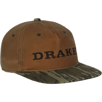Waxed Flatbill Ball Cap with a brown crown and tiger-stripe camo brim, featuring DRAKE embroidered on the front, exemplifying Drake Waterfowl's stylish hunting gear.