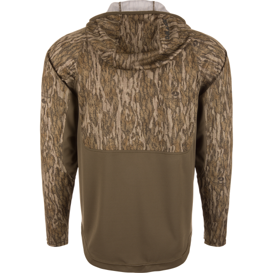 EST Performance Half-Zip Hoodie in Mossy Oak Bottomland camo, featuring ergonomic thumbholes and a water-resistant chest pocket, shown on mannequin from the back.