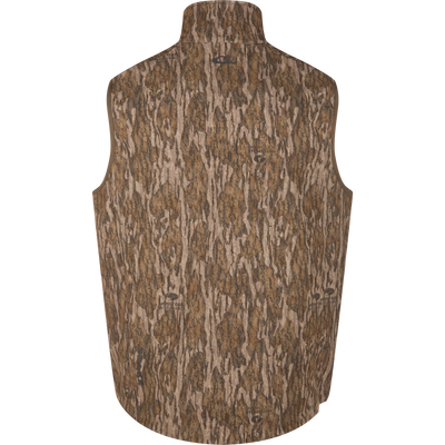 MST CommandXT Softshell Vest back panel with high-collared, sleeveless design in a brown camo pattern, featuring Mossy Oak Bottomland logo for hunting versatility.