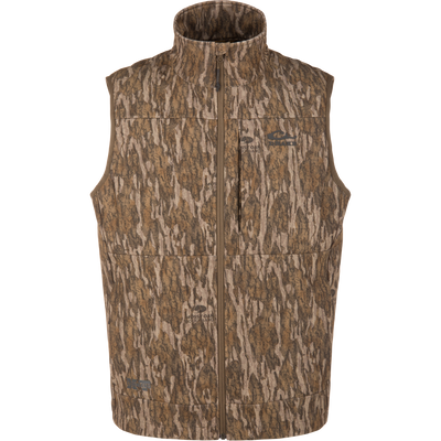 MST CommandXT Softshell Vest in Mossy Oak Bottomland pattern, featuring a zip front, stand-up collar, and subtle logos, designed for warmth, flexibility, and weather protection.