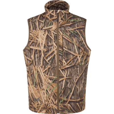 MST CommandXT Softshell Vest in marsh-grass camouflage with zip front and stand-up collar, featuring DRAKE and COMMANDER branding, designed for outdoor weather protection.