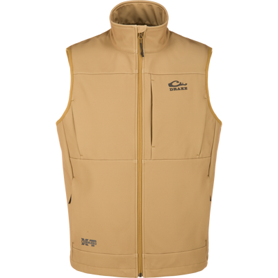 MST CommandXT Softshell Vest with Drake and XD Command logos, features a full-length zipper and fleece-lined pockets, offering windproof and water-resistant protection for outdoor activities.