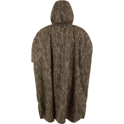 RTL - El Poncho: Back view of a camo rain poncho with hood, snap closures, and draping sides, designed for versatile weather protection in hunting environments.