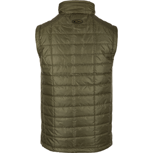 A close-up of the Synthetic Down Pac-Vest, a green puffy jacket with a water-repellent finish. Stay dry and protected with this 100% polyester shell, featuring YKK zippered side slash pockets and a drawcord waist. Perfect for outdoor adventures!