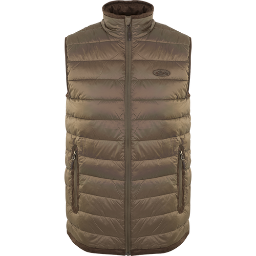 A bronze-colored durable Synthetic Double Down Vest from Drake Waterfowl, featuring a horizontal baffle design, 160g synthetic down insulation, reverse coil zippers, and suede accents. Perfect for cold days outdoors.
