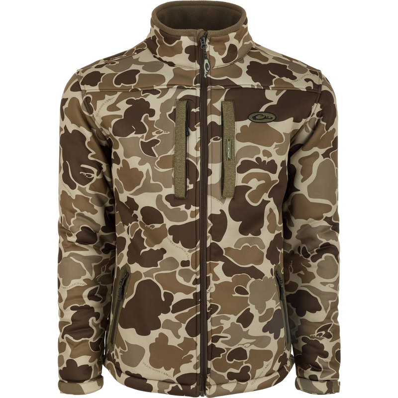 LST Silencer Full Zip Jacket: A camouflage jacket with a soft, durable fabric. Features vertical chest pockets and fleece-lined lower zippered pockets for secure storage. Perfect for hunters seeking warmth and breathability.