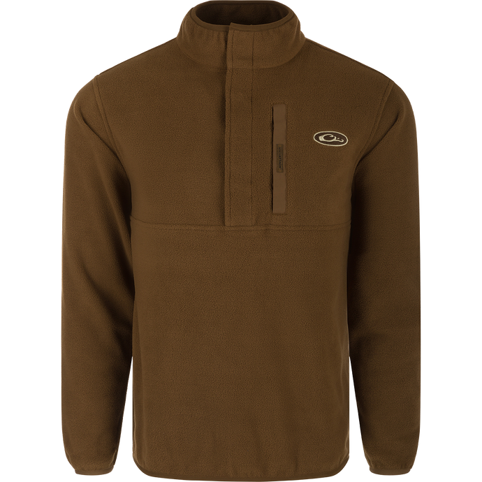 A close-up of the Camp Fleece Pullover 2.0, a brown fleece jacket with a logo. Perfect for layering with other Drake outerwear.