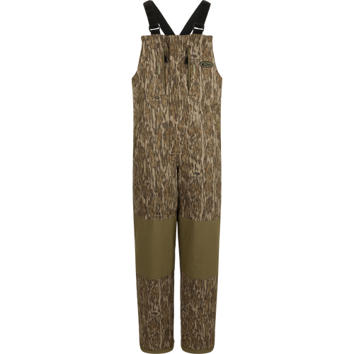 LST Youth Reflex Insulated Bib: Camouflage overalls with straps, knee-length zippers, reinforced knees and seat. Waterproof and windproof.