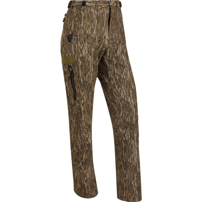 EST Camo Stretch Tech Pants: Lightweight, breathable polyester pants with adjustable waistband, multiple pockets, and elastic ankle cinch cord. Perfect for hunting in any season.