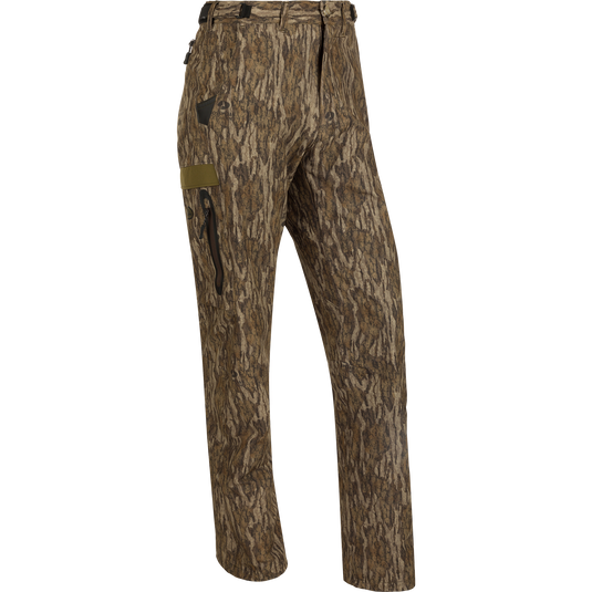 EST Camo Stretch Tech Pants: Lightweight, breathable polyester pants with adjustable waistband, multiple pockets, and elastic ankle cinch cord. Perfect for hunting in any season.