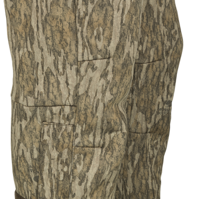 MST Ultimate Wader Pants displaying adjustable ankle zippers and side-elastic waist, ideal for comfort under waders or casual use, embodying Drake Waterfowl's commitment to versatile hunting apparel.
