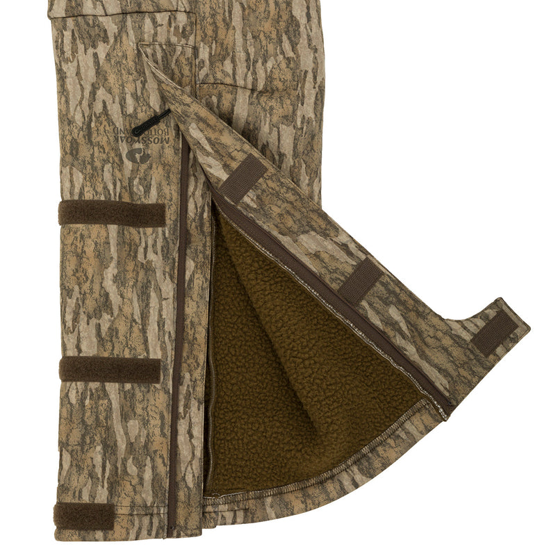 MST Ultimate Wader Pants - Old School: Camouflage pants with brown lining and adjustable ankle fit for wearing under waders or as casual pants. Side-elastic waist, silicone grip waistband, 4-way stretch, gusseted crotch, and zippered rear security pockets.