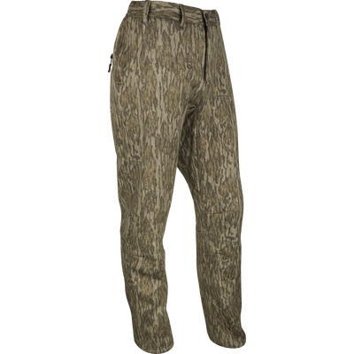 MST Ultimate Wader Pants with side zippers and elastic waist, designed for comfort under waders or casual wear. Features articulated knees and zippered pockets.