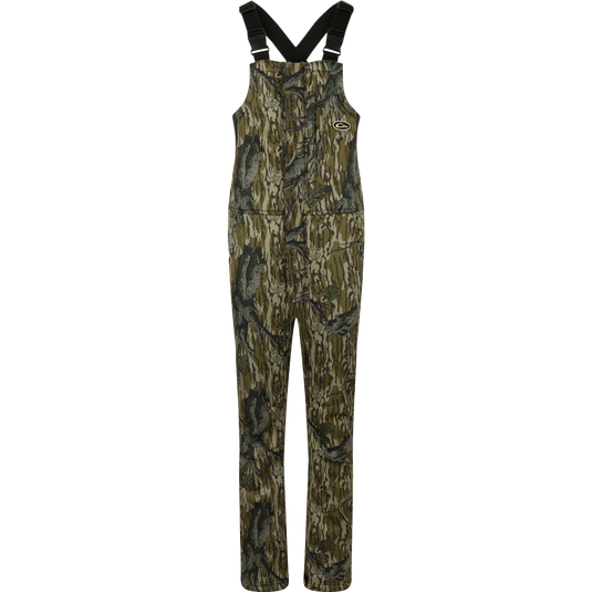 MST Ultimate Wader Bib: Camouflage overalls with straps, 4-way stretch, gusseted crotch, and articulated knees for easy movement. Sherpa-lined slash handwarmer pockets, Magnattach™ chest pocket, and zippered rear security pockets for storage. Ankle-fit for under waders.