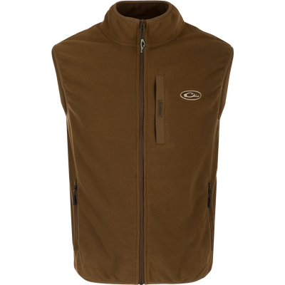 A lightweight, moisture-wicking Camp Fleece Vest with anti-pill treatment. Features vertical Magnattach™ pocket and lower zippered hand warmer pockets. Perfect for layering under your favorite Drake outerwear or for any Spring or Fall outfit.