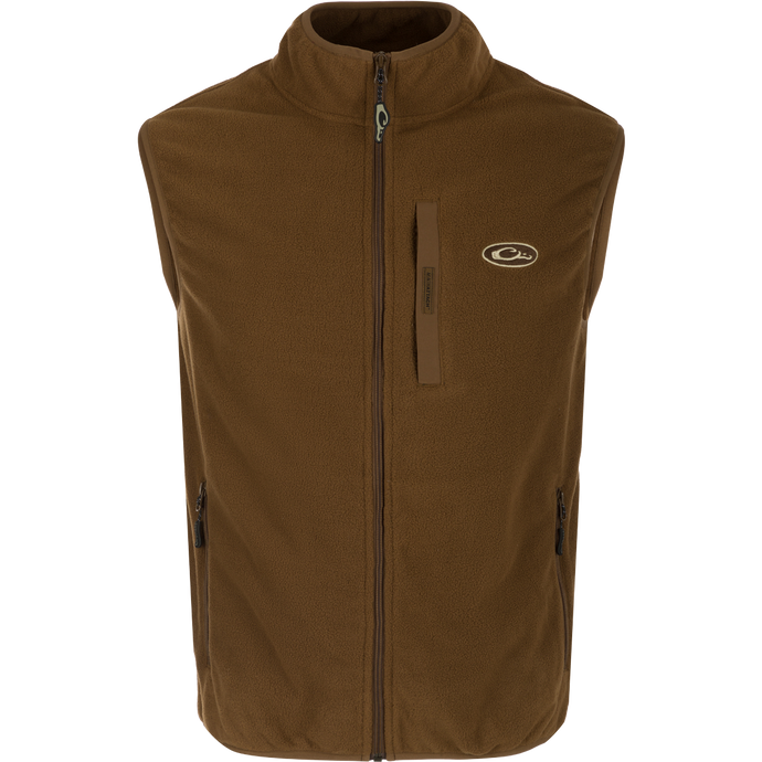 A lightweight, moisture-wicking Camp Fleece Vest with anti-pill treatment. Features vertical Magnattach™ pocket and lower zippered hand warmer pockets. Perfect for layering under your favorite Drake outerwear or for any Spring or Fall outfit.