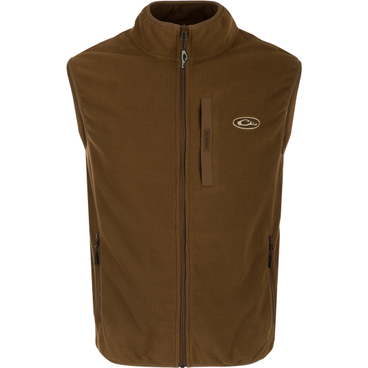 A lightweight, moisture-wicking Camp Fleece Vest with anti-pill treatment. Features vertical Magnattach™ pocket and lower zippered hand warmer pockets. Perfect for layering under your favorite Drake outerwear or for any Spring or Fall outfit.