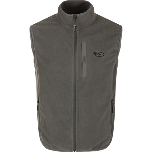 A lightweight, moisture-wicking Camp Fleece Vest with anti-pill treatment. Features include Magnattach™ pocket and zippered hand warmer pockets.