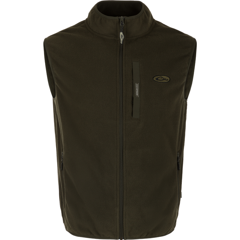 A close-up of the Camp Fleece Vest, a black outerwear with a zipper. Perfect for layering under Drake outerwear or for any Spring or Fall outfit.