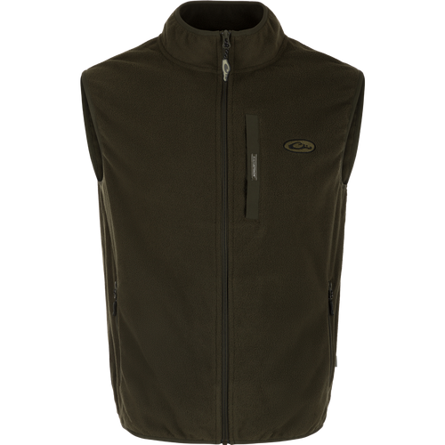 A close-up of the Camp Fleece Vest, a black outerwear with a zipper. Perfect for layering under Drake outerwear or for any Spring or Fall outfit.