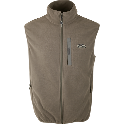 Close-up of Moss Camp Fleece Vest zipper, featuring anti-pill treatment, moisture-wicking fabric, Magnattach™ pocket, and hand warmer pockets. Ideal for layering under Drake outerwear.
