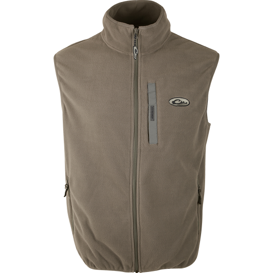 Close-up of Moss Camp Fleece Vest zipper, featuring anti-pill treatment, moisture-wicking fabric, Magnattach™ pocket, and hand warmer pockets. Ideal for layering under Drake outerwear.