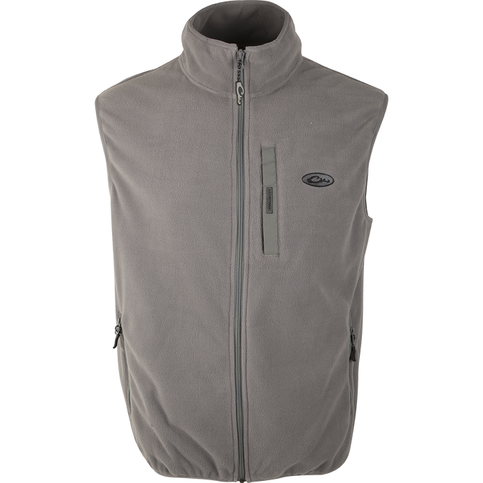 A versatile Camp Fleece Vest in Titanium by Drake Waterfowl, ideal for layering under outerwear. Features include anti-pill treatment, moisture-wicking fabric, and practical pockets.