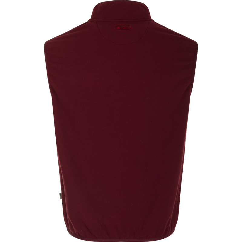 A windsor wine versatile Camp Fleece Vest from Drake Waterfowl, ideal for layering under outerwear. Features anti-pill, moisture-wicking fabric with Magnattach™ pocket and zippered hand warmer pockets.