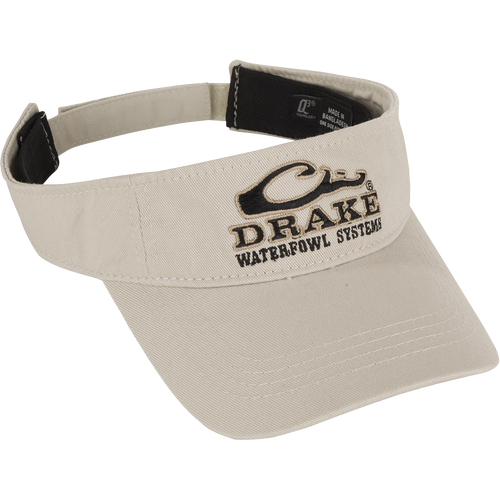 A low-profile Drake Logo Visor with embroidered logo on the front and a Velcro back closure. Made of 100% cotton or 100% polyester. One size fits most.