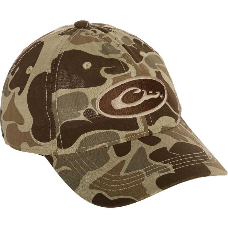 Camo Cotton Cap with logo, featuring full camo concealment, lightweight cotton, 6-panel construction, and hook and loop closure.