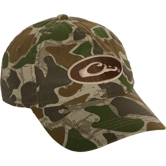 Camo Cotton Cap with logo, 6-panel construction, and hook and loop closure. Lightweight and comfortable for outdoor activities.