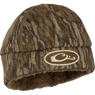 LST Windstopper Beanie: A camouflage hat with a logo, perfect for hunting and outdoor activities.