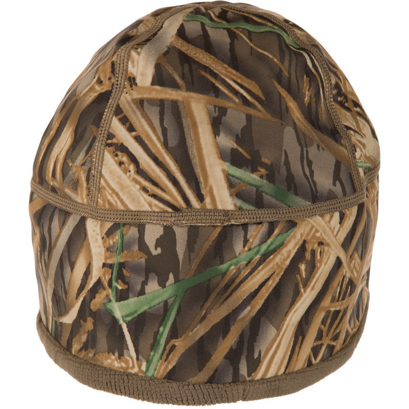MST Windstopper Beanie in marsh-grass camo, designed for hunters. Windproof, breathable, and ultra-soft, covering ears for warmth in cold, windy conditions.