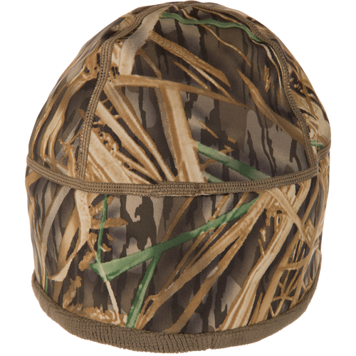 MST Windstopper Beanie in marsh-grass camo, designed for hunters. Windproof, breathable, and ultra-soft, covering ears for warmth in cold, windy conditions.