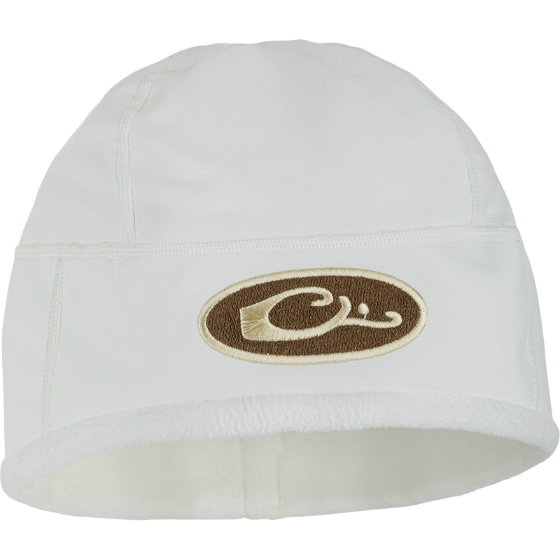 MST Windstopper Beanie with brown-and-cream logo on cuff, featuring a windproof, breathable design and grid-fleece lining for ear coverage and warmth.