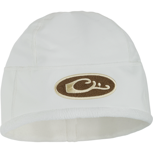 MST Windstopper Beanie with brown-and-cream logo on cuff, featuring a windproof, breathable design and grid-fleece lining for ear coverage and warmth.