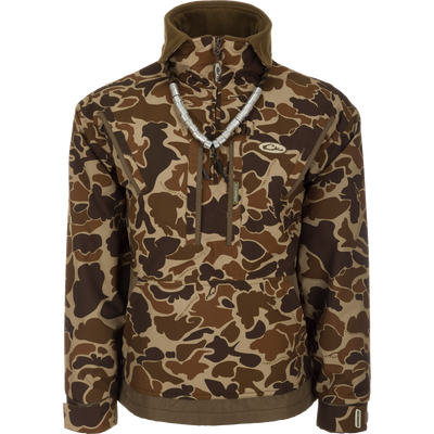 MST Waterproof Fleece-Lined Quarter Zip Jacket in camouflage with high collar, chest pockets, kangaroo pouch, and adjustable cuffs, ideal for mid-season hunting.