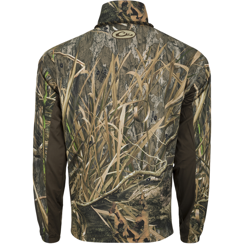 Backside of camouflage EST 1/4 Zip Pullover Shirt by Drake Waterfowl, featuring a lightweight, water-resistant design with Magnattach™ pocket and breathable knit sides for hunting and training.