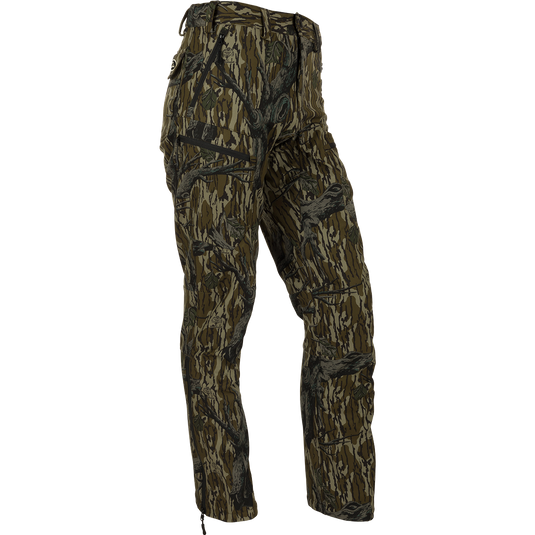 MST Softshell Waterfowler Pants - Camouflage hunting trousers with secure pockets, articulated knees, and lower-leg side zips for easy on/off over boots. Versatile and comfortable for mid-season or late-season field hunts.