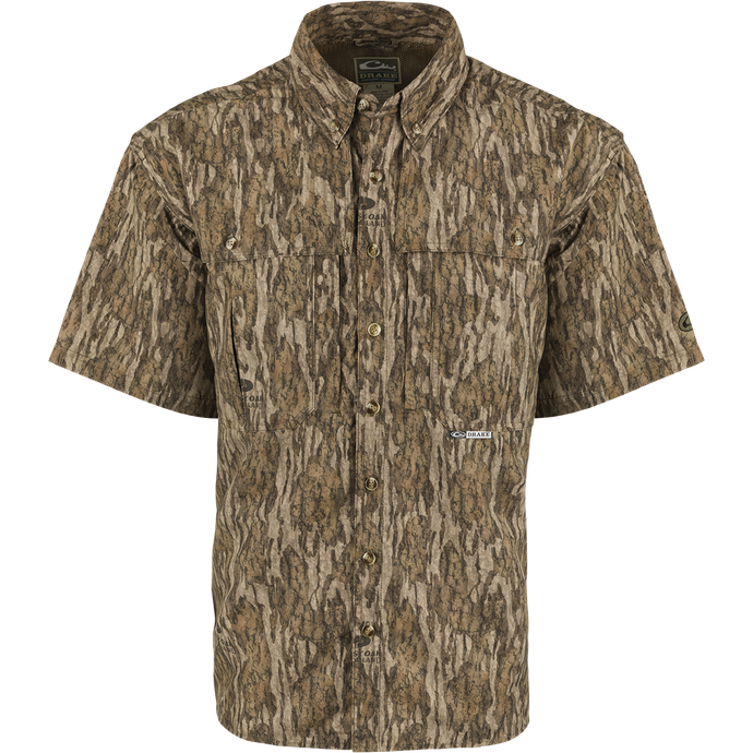 EST Camo Wingshooter's Shirt S/S: Lightweight, breathable shirt for dove hunts, teal and goose hunts, or the shooting range. Vented areas and mesh back for air circulation. Magnattach pocket, heat vents, sun blocker collar, and large chest pockets. Wrinkle-resistant EasyCare fabric.
