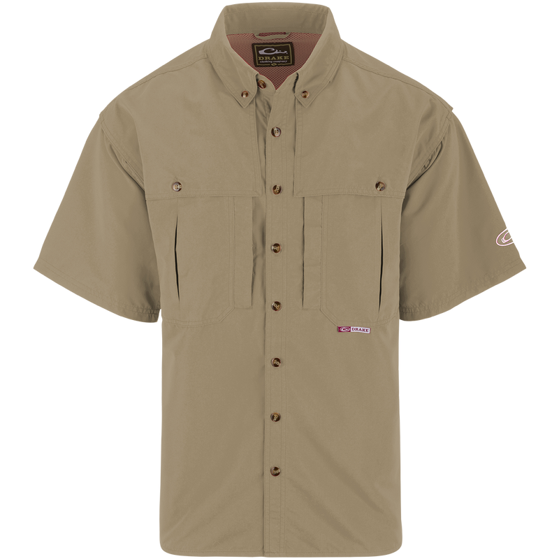 Solid Wingshooter's Shirt S/S: Breathable, quick-drying shirt with front and back ventilation. Features oversized chest pockets, Magnattach™ pocket, and zippered vertical pocket. Perfect for field or water activities.