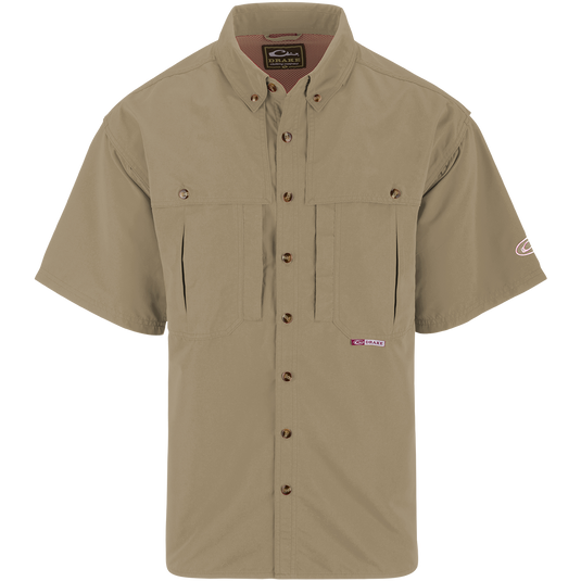 Solid Wingshooter's Shirt S/S: Breathable, quick-drying shirt with front and back ventilation. Features oversized chest pockets, Magnattach™ pocket, and zippered vertical pocket. Perfect for field or water activities.