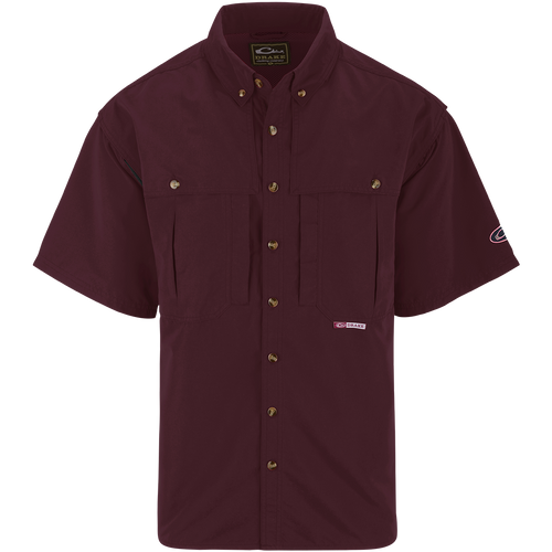 Solid Wingshooter's Shirt S/S: Breathable, quick-drying shirt with front and back ventilation. Features oversized chest pockets, Magnattach™ pocket, and zippered pocket. Perfect for field or water activities.