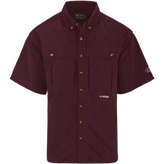 Solid Wingshooter's Shirt S/S: Breathable, quick-drying shirt with front and back ventilation. Features oversized chest pockets, Magnattach™ pocket, and zippered pocket. Perfect for field or water activities.