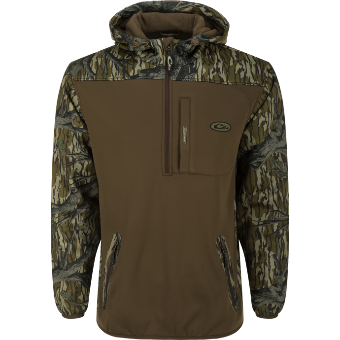 MST Endurance Soft Shell Hoodie: Camouflage jacket with Magnattach™ Call Pocket, zipped lower pockets, mesh-lined sleeves, deep quarter-zip neck, fleece-lined hood with drawstring, and elastic waist hem.